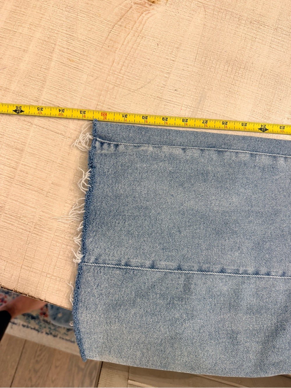 Good American Light Blue Flare Jeans with Raw Hem - Picture 6 of 8